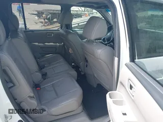 2014 Honda Pilot EX-L with VIN 5FNYF3H50EB005811, listed as a IAAI auction lot 42115804 with 216,033 mi miles and . Bid and sale history available at DreamBid. Image 8.