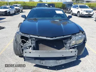 2013 Chevrolet Camaro LT z VIN 2G1FC1E30D9128690, wystawiony jako IAAI lot #41856470 z przebiegiem 139 573 mil mil oraz . Historia ofert i sprzedaży dostępna na DreamBid. Obrazek 13.
