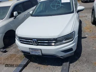 2018 Volkswagen Tiguan S with VIN 3VV1B7AX8JM032990, listed as a IAAI auction lot 42279807 with 74,185 mi miles and . Bid and sale history available at DreamBid. Image 13.