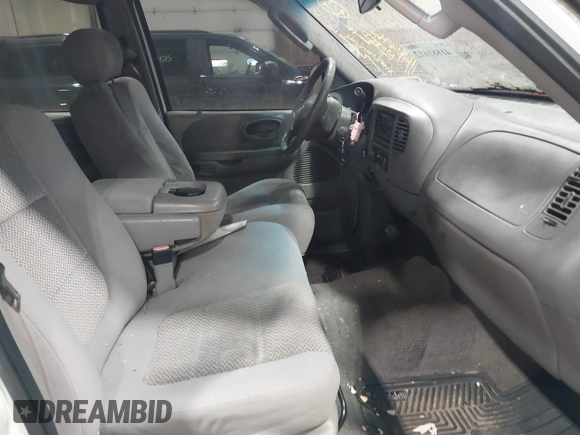 2002 Ford F-150 XLT with VIN 1FTRW08L02KE16948, listed as a IAAI auction lot 41881612 with 168,471 mi miles. Bid and sale history available at carsss.com. Image 5.
