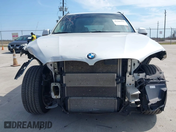 2016 BMW X5 xDrive40e with VIN 5UXKT0C51G0S76171, listed as a IAAI auction lot 41586244 with 85,517 mi miles and . Bid and sale history available at DreamBid. Image 13.