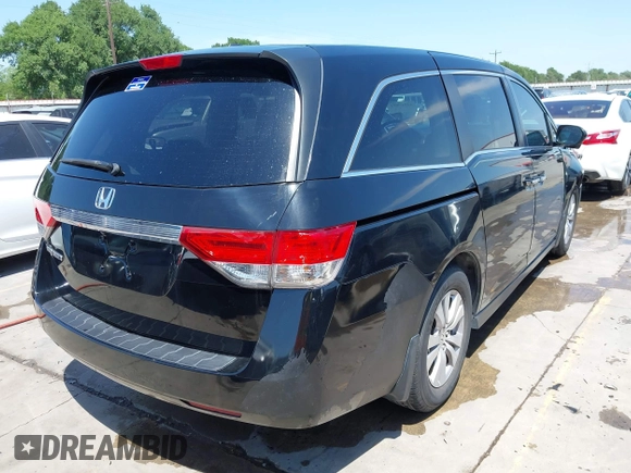 2016 Honda Odyssey EX-L with VIN 5FNRL5H61GB089853, listed as a IAAI auction lot 42019081 with 81,317 mi miles and . Bid and sale history available at DreamBid. Image 4.