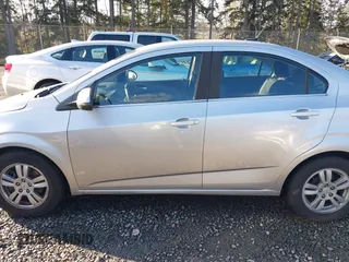 2012 Chevrolet Sonic LT with VIN 1G1JC5SH0C4178833, listed as a IAAI auction lot 41400504 with 163,356 mi miles and . Bid and sale history available at DreamBid. Image 14.