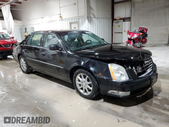 2010 Cadillac DTS 1SC z VIN 1G6KD5EY7AU128077, wystawiony jako Copart lot #58089475 z przebiegiem 203 830 mil mil oraz Szkody całkowita. Historia ofert i sprzedaży dostępna na DreamBid. Obrazek 4.