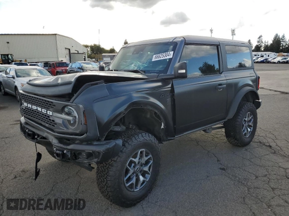 2023 Ford Bronco with VIN 1FMDE5CP1PLA92944, listed as a Copart auction lot 66625304 with 115,179 mi miles and Salvage title. Bid and sale history available at DreamBid. Image 1.