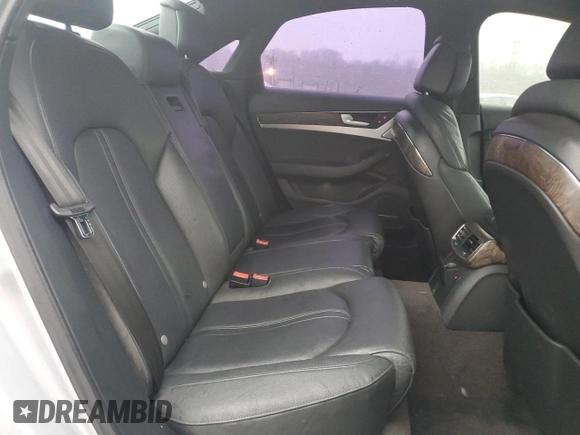 2015 Audi A8 z VIN WAUJGAFD0FN010021, wystawiony jako Copart lot #86861684 z przebiegiem 112 697 mil mil oraz Szkoda całkowita • Salvage title. Historia ofert i sprzedaży dostępna na DreamBid. Obrazek 10.
