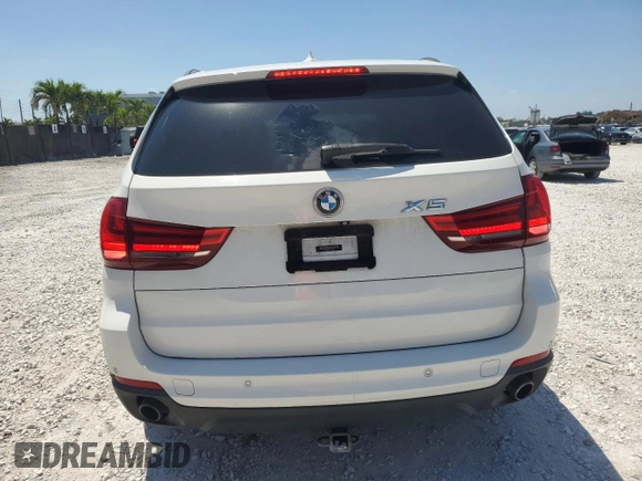 2014 BMW X5 xDrive35i with VIN 5UXKR0C52E0H20513, listed as a Copart auction lot 52831615 with 111,414 mi miles and Salvage Title. Bid and sale history available at carsss.com. Image 6.