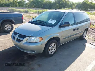 2003 Dodge Caravan SE with VIN 1D4GP24303B188329, listed as a IAAI auction lot 42532703 with 184,018 mi miles and . Bid and sale history available at DreamBid. Image 2.