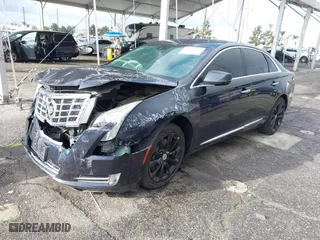 2013 Cadillac XTS Luxury with VIN 2G61P5S32D9121518, listed as a IAAI auction lot 41736434 with 97,250 mi miles. Bid and sale history available at carsss.com. Image 17.