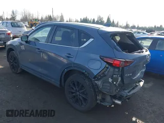 2021 Mazda CX-5 Touring with VIN JM3KFACM6M0483194, listed as a IAAI auction lot 41503907 with 41,237 mi miles. Bid and sale history available at carsss.com. Image 3.