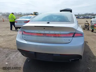 2016 Lincoln MKZ with VIN 3LN6L2G90GR625733, listed as a IAAI auction lot 41990706 with 104,962 mi miles. Bid and sale history available at carsss.com. Image 16.