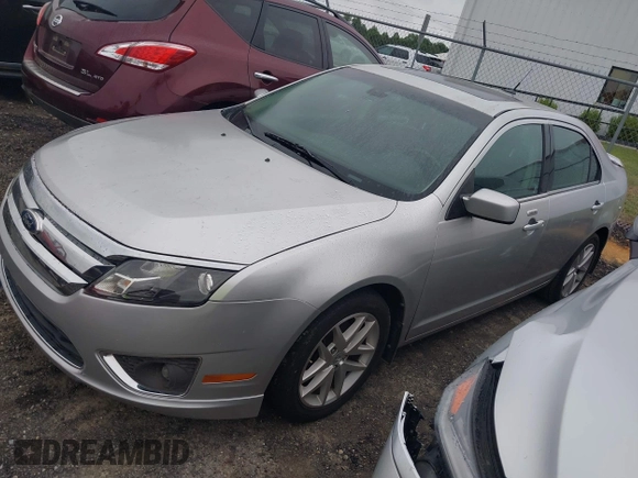 2012 Ford Fusion SEL z VIN 3FAHP0JA4CR191566, wystawiony jako IAAI lot #42358149 z przebiegiem 141 929 mil mil oraz . Historia ofert i sprzedaży dostępna na DreamBid. Obrazek 2.