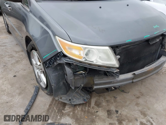 2012 Honda Odyssey Touring with VIN 5FNRL5H96CB138548, listed as a IAAI auction lot 41471856 with 186,284 mi miles and . Bid and sale history available at DreamBid. Image 6.