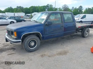 2000 GMC Sierra 3500 z VIN 1GTGC33R1YF502154, wystawiony jako IAAI lot #42183662 z przebiegiem 157 504 mil mil oraz . Historia ofert i sprzedaży dostępna na DreamBid. Obrazek 2.