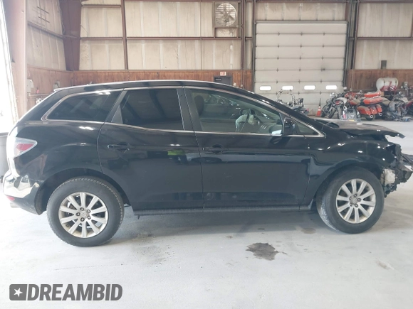 2010 Mazda CX-7 Sport with VIN JM3ER2WMXA0305807, listed as a IAAI auction lot 42022020 with 200,905 mi miles and . Bid and sale history available at DreamBid. Image 13.