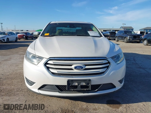 2015 Ford Taurus Limited с VIN 1FAHP2F85FG169704, выставлен на аукционе IAAI как лот 41152599 с пробегом 167 589 миль миль и . История ставок и продаж доступна на DreamBid. Изображение 12.