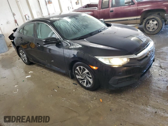 2016 Honda Civic EX with VIN 19XFC2F70GE023085, listed as a Copart auction lot 54716635 with 208,461 mi miles and Salvage Title. Bid and sale history available at DreamBid. Image 4.