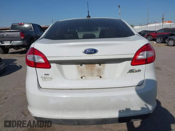 2012 Ford Fiesta SE with VIN 3FADP4BJ0CM207764, listed as a IAAI auction lot 41852699 with 143,287 mi miles. Bid and sale history available at carsss.com. Image 16.