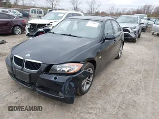2008 BMW 3 Series 328xi with VIN WBAVC93548KZ73131, listed as a IAAI auction lot 42052857 with 118,077 mi miles. Bid and sale history available at carsss.com. Image 2.