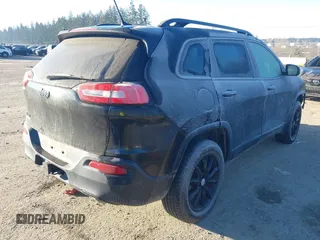 2014 Jeep Cherokee Latitude with VIN 1C4PJMCS7EW286546, listed as a IAAI auction lot 41398331 with 73,650 mi miles and . Bid and sale history available at DreamBid. Image 4.