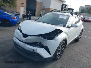 2019 Toyota C-HR XLE with VIN JTNKHMBX4K1040772, listed as a IAAI auction lot 41812031 with 79,729 mi miles. Bid and sale history available at carsss.com. Image 21.