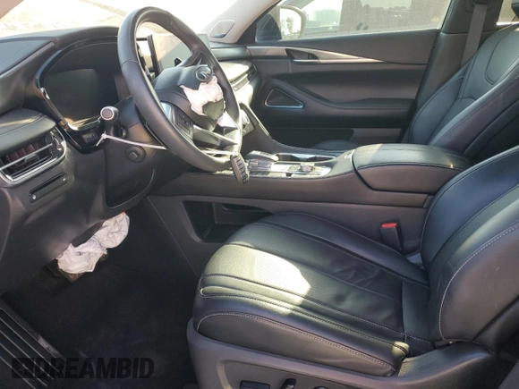 2023 Infiniti QX60 Luxe с VIN 5N1DL1FS3PC362013, выставлен на аукционе Copart как лот 50797025 с пробегом 40 525 миль миль и На запчасти • Non repairable. История ставок и продаж доступна на DreamBid. Изображение 7.