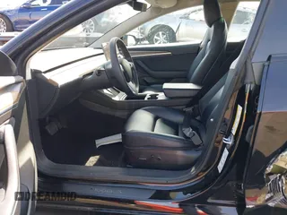 2022 Tesla Model 3 Long Range with VIN 5YJ3E1EB1NF133356, listed as a IAAI auction lot 41568303 with 73,406 mi miles and . Bid and sale history available at DreamBid. Image 5.