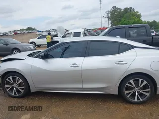 2016 Nissan Maxima SR with VIN 1N4AA6AP7GC430106, listed as a IAAI auction lot 42061991 with 186,775 mi miles and . Bid and sale history available at DreamBid. Image 15.