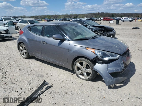 2014 Hyundai Veloster z VIN KMHTC6AD3EU215750, wystawiony jako Copart lot #52769165 z przebiegiem 114 364 mil mil oraz Szkoda całkowita • Salvage title. Historia ofert i sprzedaży dostępna na DreamBid. Obrazek 4.