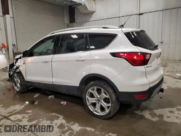2019 Ford Escape Titanium with VIN 1FMCU9J94KUA02845, listed as a Copart auction lot 52096895 with 69,689 mi miles and Salvage Title. Bid and sale history available at carsss.com. Image 2.