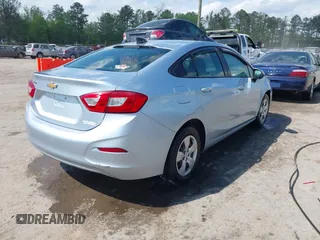 2018 Chevrolet Cruze LS with VIN 1G1BC5SM0J7157137, listed as a IAAI auction lot 42093172 with 104,943 mi miles and . Bid and sale history available at DreamBid. Image 4.