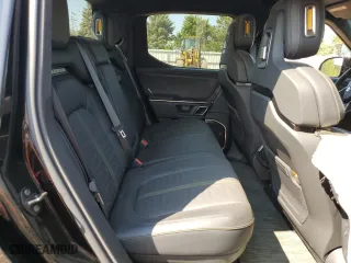 2024 Rivian R1T Adventure Package with VIN 7FCTGAAA3RN033543, listed as a Copart auction lot 65133364 with 0 mi miles and Salvage Title. Bid and sale history available at carsss.com. Image 10.
