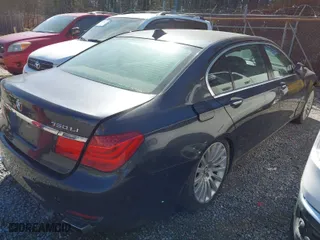 2012 BMW 7 Series 750Li xDrive with VIN WBAKC8C55CC436123, listed as a IAAI auction lot 41779443 with 126618 miles. Bid and sale history available at carsss.com. Image 4.