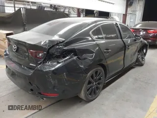 2024 Mazda 3 S Select Sport z VIN 3MZBPABMXRM432614, wystawiony jako IAAI lot #41654313 z przebiegiem Nie podano mil oraz . Historia ofert i sprzedaży dostępna na DreamBid. Obrazek 4.