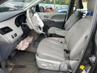 2013 Toyota Sienna XLE AAS with VIN 5TDYK3DCXDS333764, listed as a Copart auction lot 77682814 with 131,915 mi miles and Salvage Title. Bid and sale history available at DreamBid. Image 7.