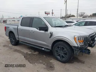 2021 Ford F-150 XL with VIN 1FTEW1C85MFB53536, listed as a IAAI auction lot 41343773 with 101,407 mi miles. Bid and sale history available at carsss.com. Image 1.