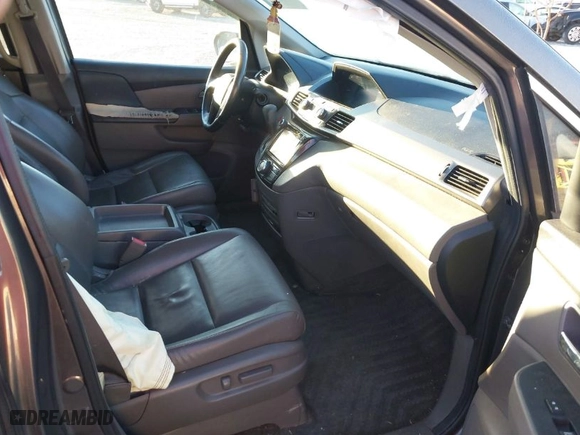 2015 Honda Odyssey EX-L with VIN 5FNRL5H62FB038540, listed as a IAAI auction lot 41826740 with 166,298 mi miles. Bid and sale history available at carsss.com. Image 5.