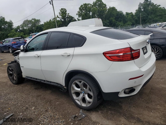 2014 BMW X6 xDrive35i with VIN 5UXFG2C59E0C45459, listed as a Copart auction lot 63804334 with 302,443 mi miles and Salvage Title. Bid and sale history available at carsss.com. Image 2.