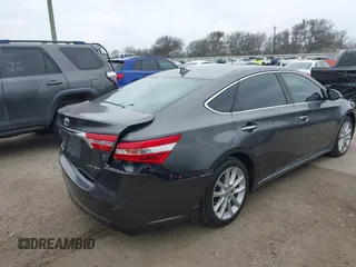 2015 Toyota Avalon Limited with VIN 4T1BK1EB4FU167011, listed as a IAAI auction lot 41582722 with 77,314 mi miles and . Bid and sale history available at DreamBid. Image 4.