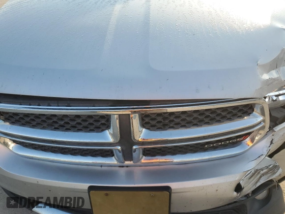 2013 Dodge Durango Crew with VIN 1C4RDHDG1DC616909, listed as a Copart auction lot 61923565 with 98,264 mi miles and Salvage title. Bid and sale history available at DreamBid. Image 12.