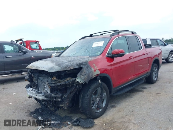 2023 Honda Ridgeline RTL with VIN 5FPYK3F53PB059323, listed as a IAAI auction lot 42485621 with Not provided miles and . Bid and sale history available at DreamBid. Image 2.