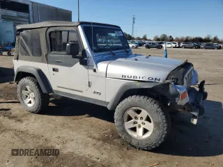 2003 Jeep Wrangler Rubicon z VIN 1J4FA69SX3P301962, wystawiony jako Copart lot #79928744 z przebiegiem Nie podano mil oraz Czysty tytuł • Clean title. Historia ofert i sprzedaży dostępna na DreamBid. Obrazek 4.