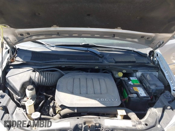 2012 Dodge Grand Caravan SXT with VIN 2C4RDGCG8CR139963, listed as a IAAI auction lot 42243745 with 185,730 mi miles and . Bid and sale history available at DreamBid. Image 10.