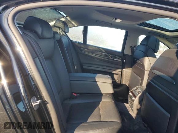 2011 BMW 7 Series 740i with VIN WBAKA4C50BC613111, listed as a Copart auction lot 78597934 with 103,778 mi miles and Salvage Title. Bid and sale history available at carsss.com. Image 10.