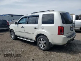 2011 Honda Pilot Touring with VIN 5FNYF4H9XBB501591, listed as a Copart auction lot 53694265 with 244,844 mi miles and Salvage Title. Bid and sale history available at DreamBid. Image 2.