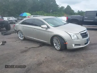 2016 Cadillac XTS Luxury Collection with VIN 2G61M5S37G9169464, listed as a IAAI auction lot 42572432 with 55,355 mi miles and . Bid and sale history available at DreamBid. Image 1.