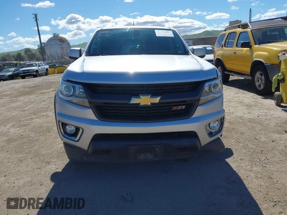 2019 Chevrolet Colorado 4WD Z71 z VIN 1GCGTDEN2K1146043, wystawiony jako IAAI lot #41712002 z przebiegiem 84 034 mil mil oraz . Historia ofert i sprzedaży dostępna na DreamBid. Obrazek 13.