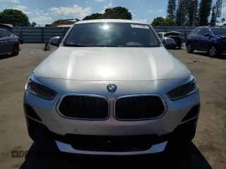 2021 BMW X2 sDrive28i z VIN WBXYH9C06M5S54903, wystawiony jako Copart lot #57177885 z przebiegiem 106 563 mil mil oraz Tytuł czysty. Historia ofert i sprzedaży dostępna na DreamBid. Obrazek 5.