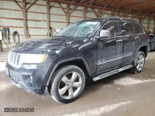 2012 Jeep Grand Cherokee Overland with VIN 1C4RJFCT2CC318931, listed as a Copart auction lot 47194825 with 65,165 mi miles and Salvage Title. Bid and sale history available at carsss.com. Image 1.