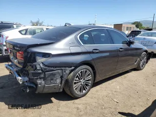 2018 BMW 5 Series 530e with VIN WBAJA9C52JB249402, listed as a Copart auction lot 55093055 with 117,033 mi miles and Salvage title. Bid and sale history available at DreamBid. Image 3.